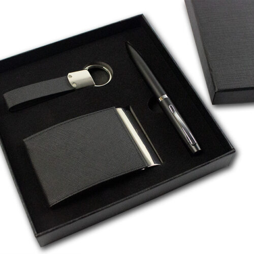 Set pentru cadou compus din pix metalic nergu, breloc, port carti vizita imitatie piele, cut carton